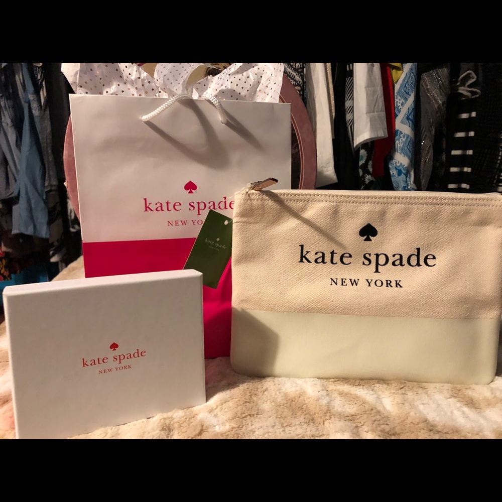 Kate spade cream signature zipper clutch